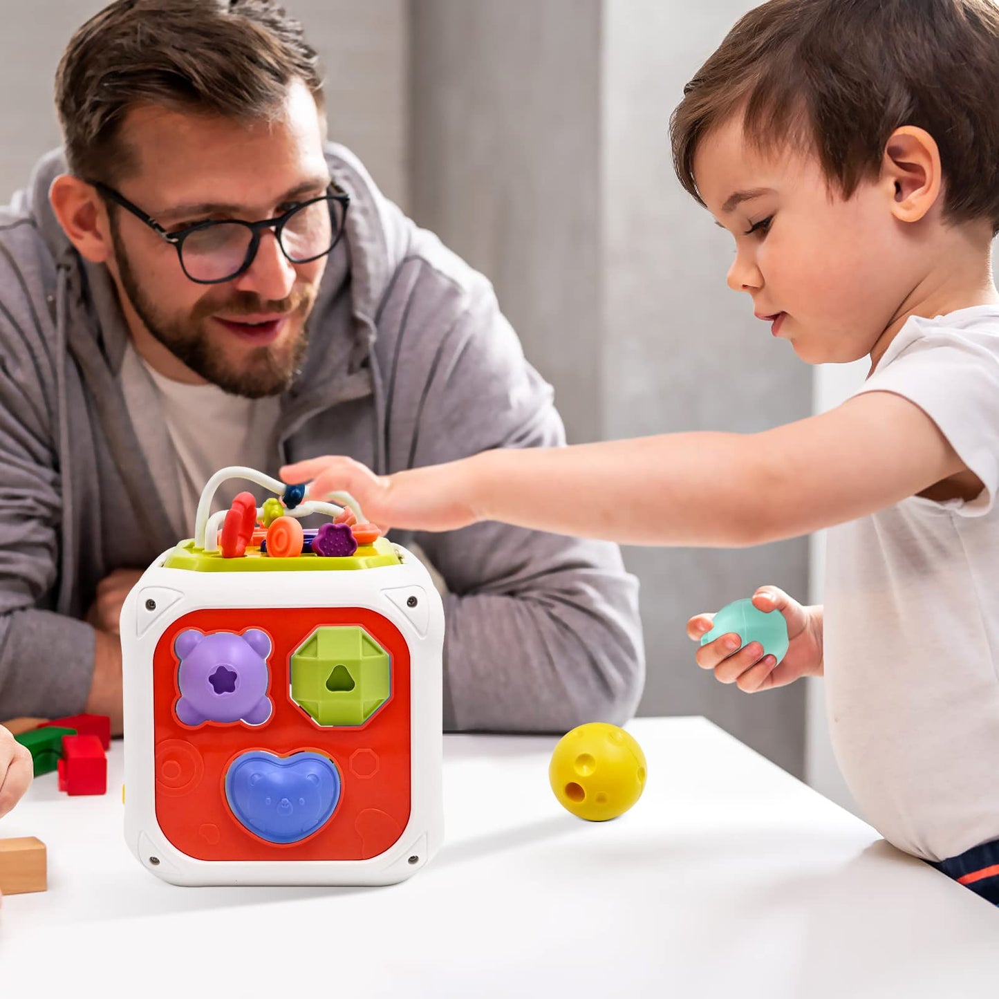 Jouet Bebe 1 2 An, 7 in 1 Montessori Sensoriel Jouets pour Bebe 6 9 12 18 Mois Naissance Fille Garcon, Cadeau Educatif Motricité Cube d'activité Jeux pour Enfants 1 2 Ans Anniversaire Noël Cadeau